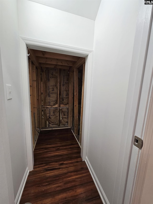 corridor with dark wood finished floors