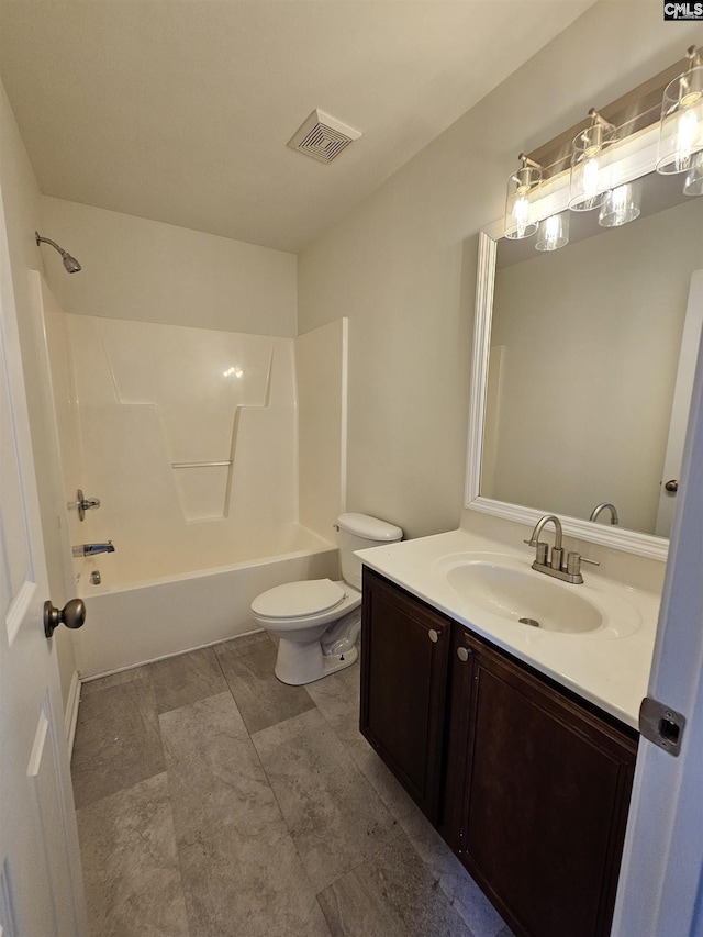 full bathroom with vanity, toilet, visible vents, and shower / washtub combination