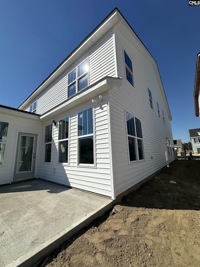 rear view of property with a patio