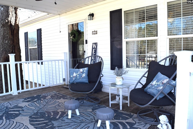 wooden deck featuring covered porch