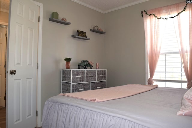 bedroom featuring ornamental molding