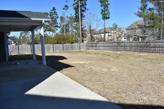 view of yard featuring a patio and a fenced backyard