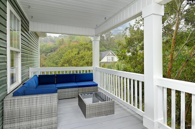 deck with an outdoor hangout area