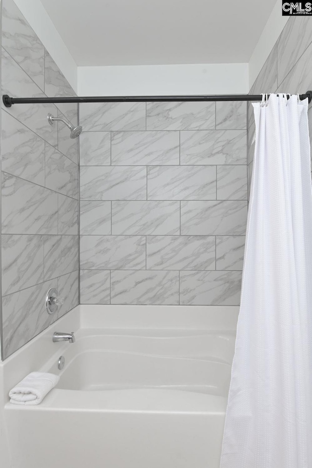 full bath featuring shower / tub combo