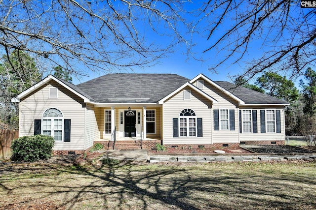 ranch-style house with crawl space, a shingled roof, and fence