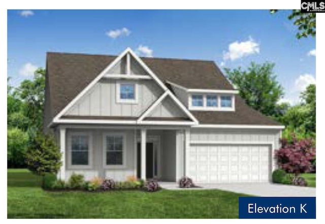 view of front of house with a garage, concrete driveway, and a front lawn