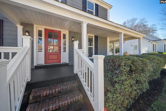 doorway to property with a porch