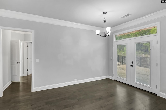 unfurnished dining area with visible vents, french doors, and ornamental molding