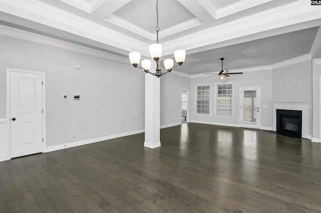 unfurnished living room with a glass covered fireplace, crown molding, baseboards, and dark wood-style flooring