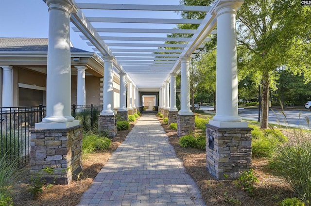 view of property's community featuring a pergola