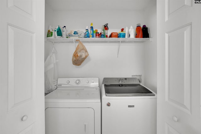 laundry room with washing machine and dryer and laundry area