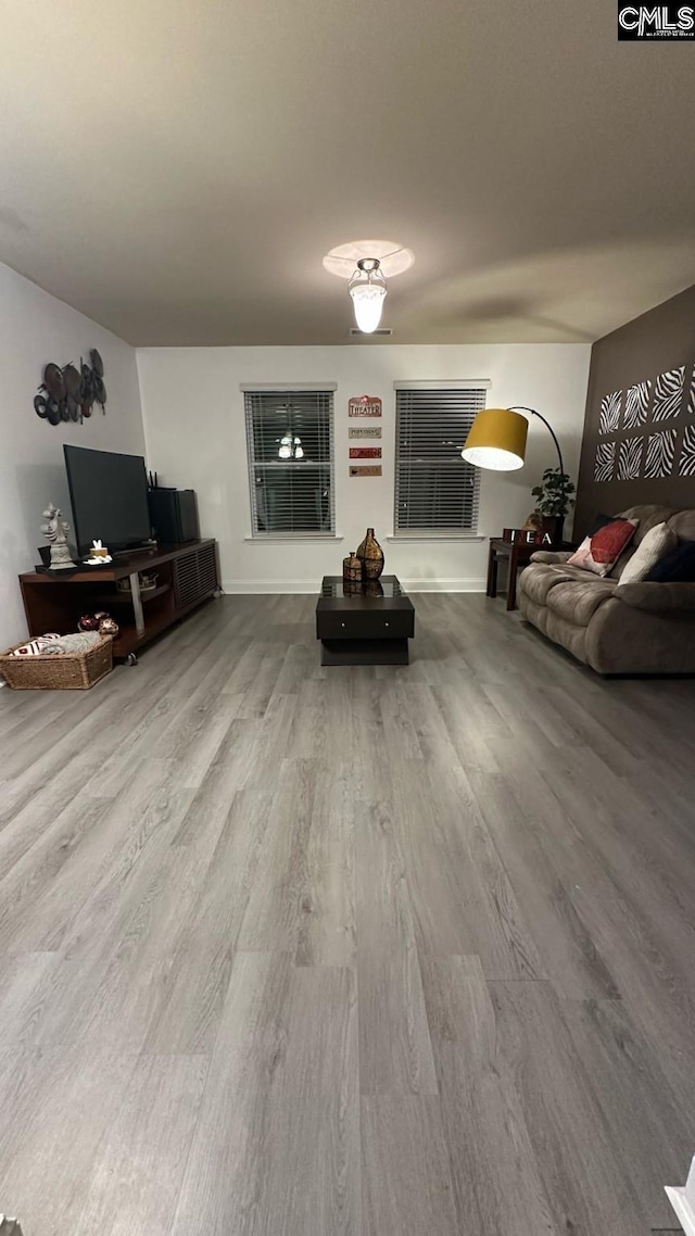 living area with wood finished floors