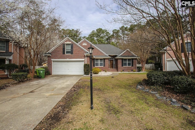 view of front facade with a front yard, brick siding, driveway, and crawl space