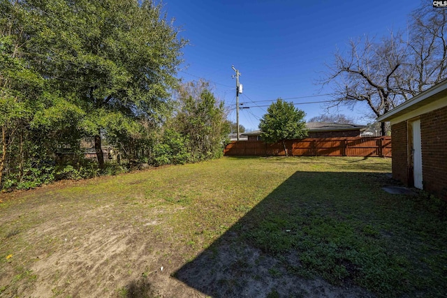 view of yard with fence