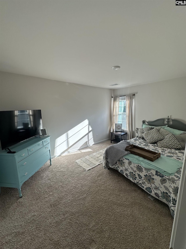 bedroom featuring carpet floors