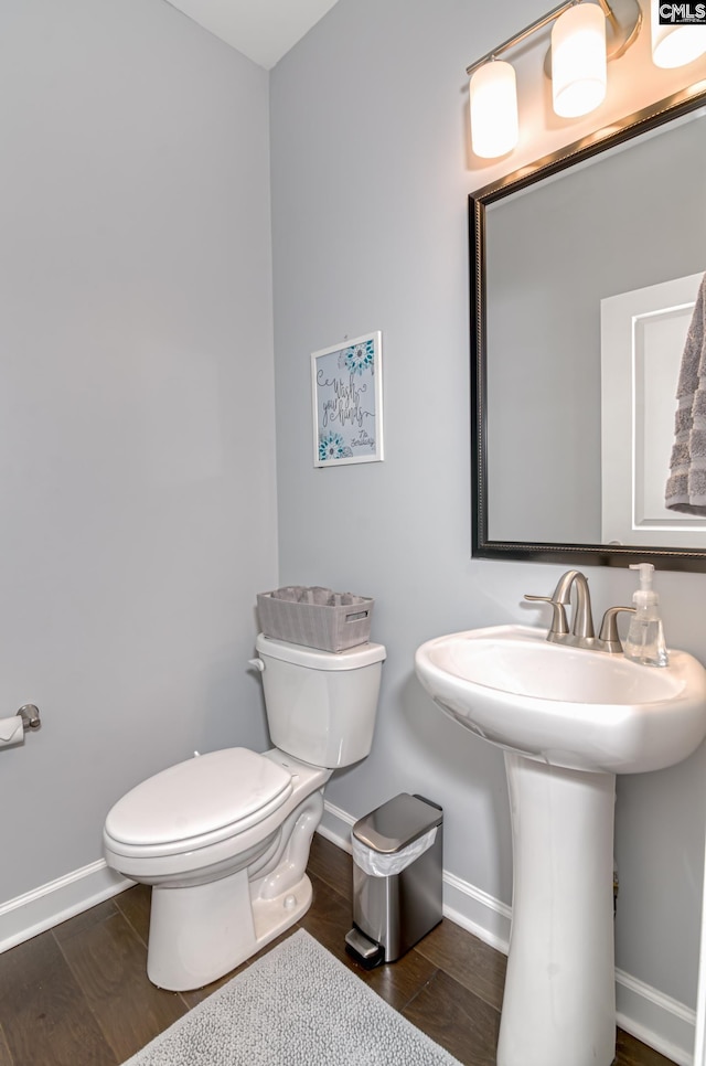 263 Compass Trl, Blythewood, SC 29016 - half bath with baseboards, toilet, and wood finished floors