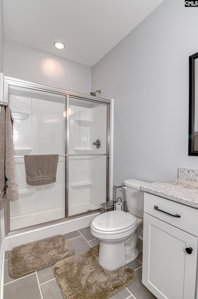 263 Compass Trl, Blythewood, SC 29016 - full bath with a shower with door, vanity, tile patterned floors, and toilet