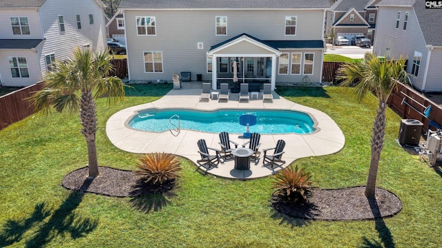 263 Compass Trl, Blythewood, SC 29016 - rear view of house with a lawn, a patio, a fenced backyard, a sunroom, and a fenced in pool