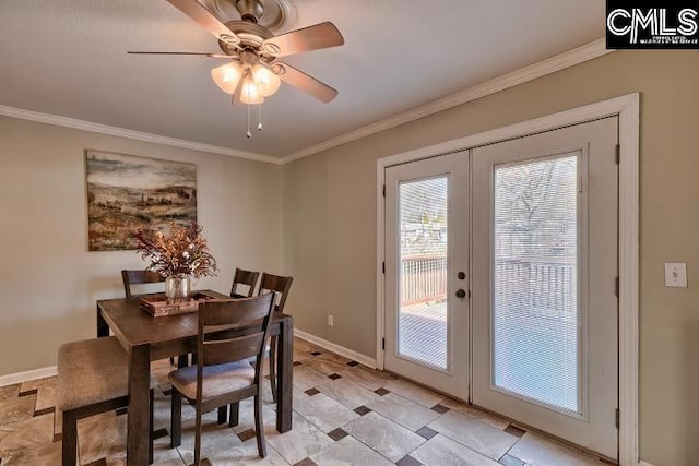 dining space featuring french doors, a ceiling fan, crown molding, and baseboards