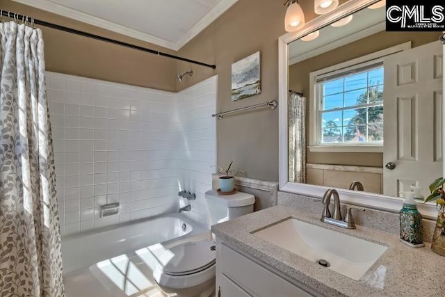 bathroom featuring shower / bath combo, toilet, vanity, and ornamental molding