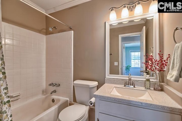 bathroom with vanity, toilet, shower / tub combo with curtain, and ornamental molding