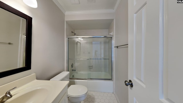 full bathroom with tile patterned flooring, crown molding, toilet, combined bath / shower with glass door, and vanity