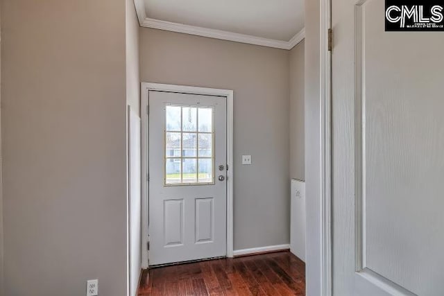 entryway featuring dark wood-type flooring and ornamental molding