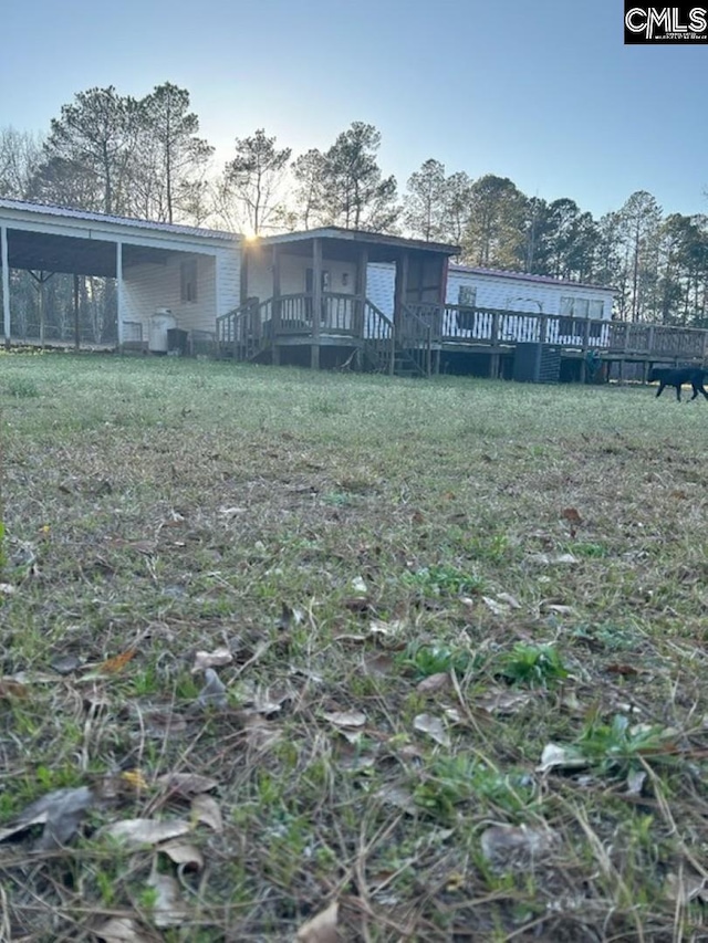 view of yard featuring a deck