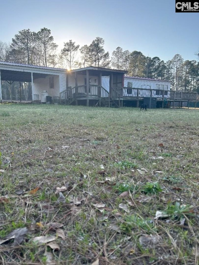 view of yard featuring a deck