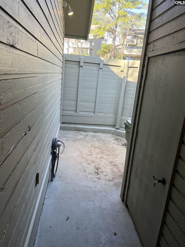 view of patio / terrace featuring fence