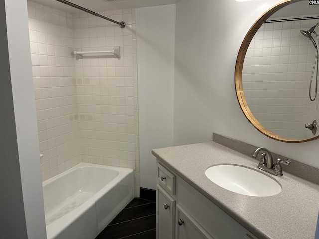 bathroom with bathtub / shower combination and vanity