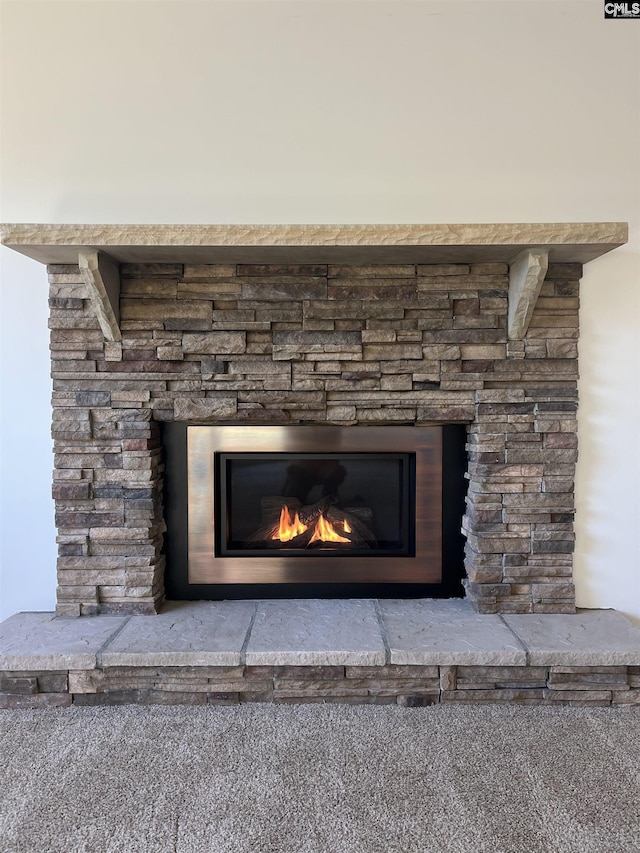 interior details featuring a fireplace