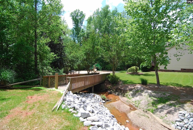 view of yard featuring a deck