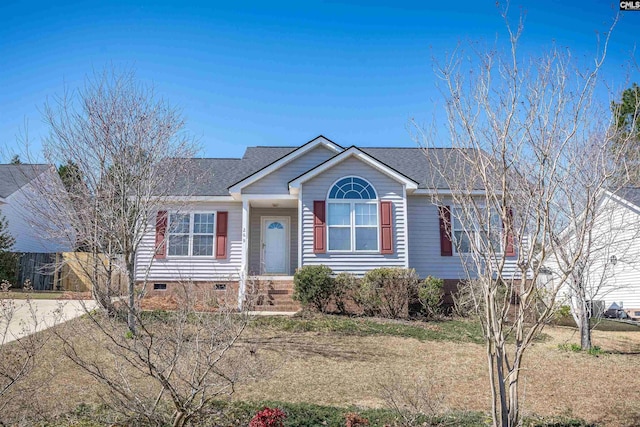 ranch-style house featuring a shingled roof and crawl space