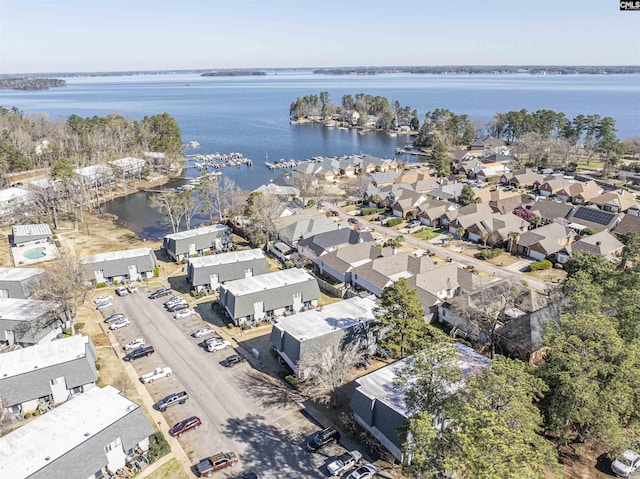 aerial view featuring a residential view and a water view