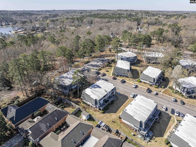 aerial view with a wooded view