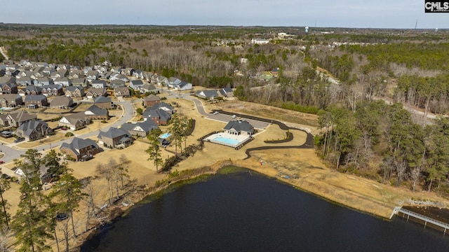 birds eye view of property featuring a residential view and a water view