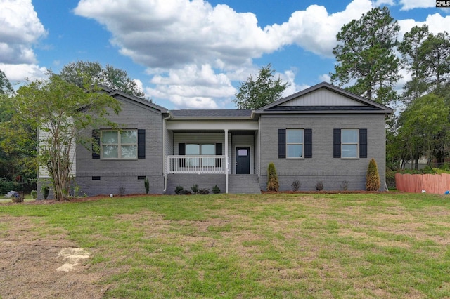 ranch-style house featuring a front lawn, a porch, fence, crawl space, and brick siding