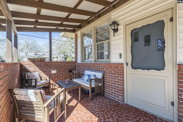 view of patio with outdoor lounge area and fence