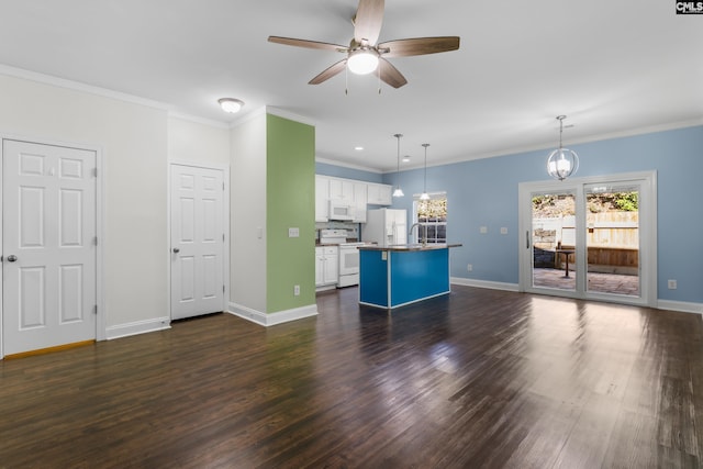 unfurnished living room with baseboards, dark wood-type flooring, ornamental molding, and ceiling fan with notable chandelier