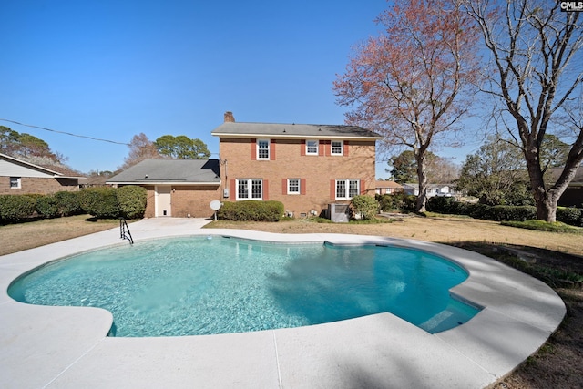 outdoor pool featuring a patio area