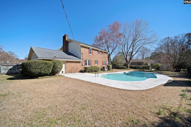 view of pool featuring a fenced in pool, a lawn, a patio, and fence