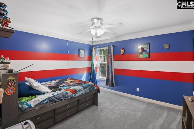 bedroom featuring baseboards, carpet floors, and ceiling fan