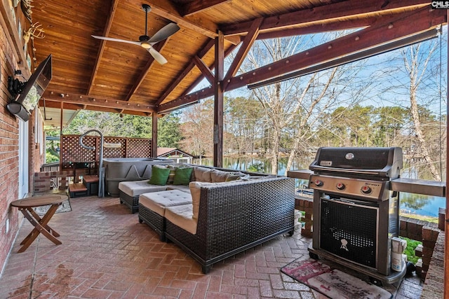 view of patio / terrace with outdoor lounge area, a ceiling fan, and a grill