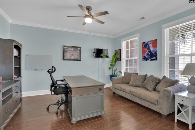 office space with dark wood finished floors, visible vents, and crown molding