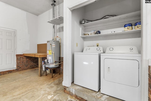 laundry area featuring water heater, laundry area, and independent washer and dryer