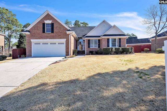 view of front facade with brick siding, a front lawn, fence, concrete driveway, and a garage