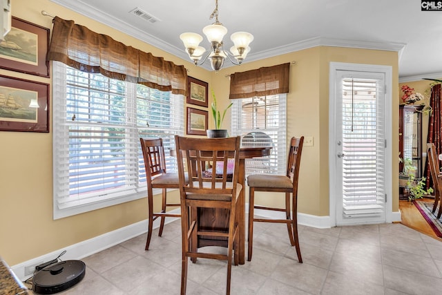 dining room with visible vents, crown molding, baseboards, an inviting chandelier, and light tile patterned flooring