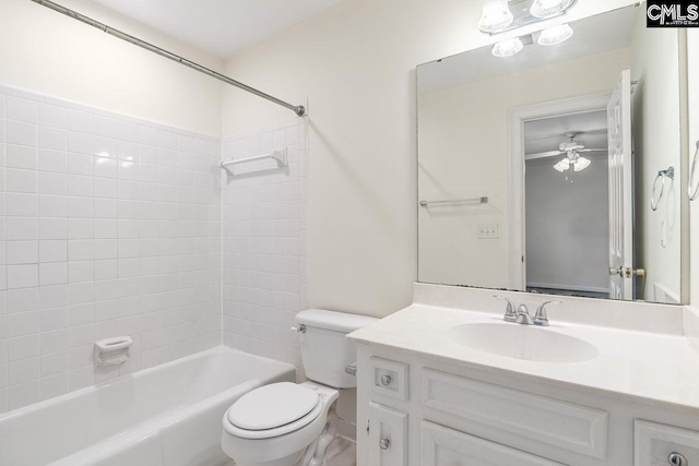 bathroom with vanity, toilet, and shower / washtub combination