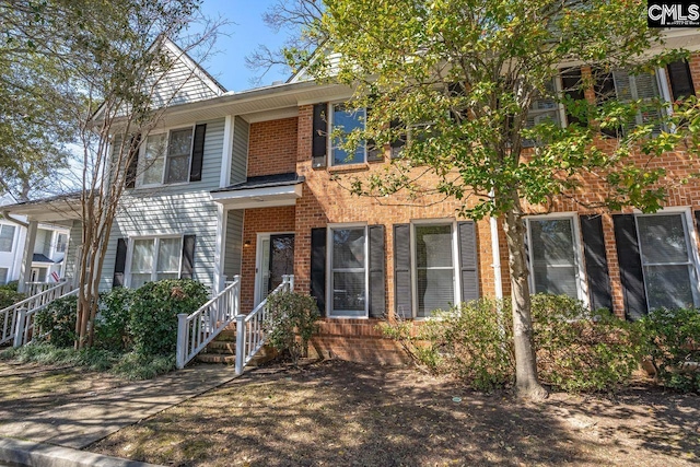 view of front of property with brick siding